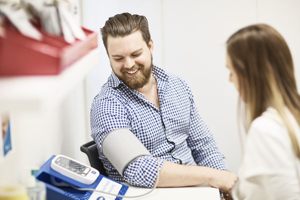 Man having his blood pressure checked